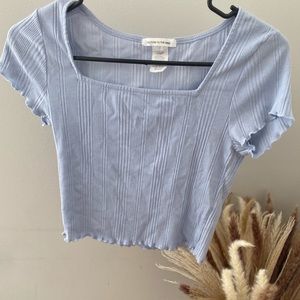 5/$25 🌱Caution To The Wind Cropped Shirt Size Medium Baby Blue